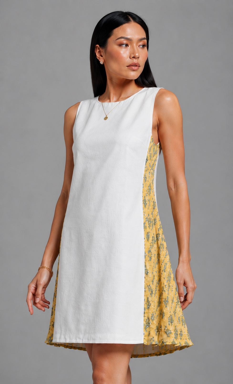 White and yellow pleated dress