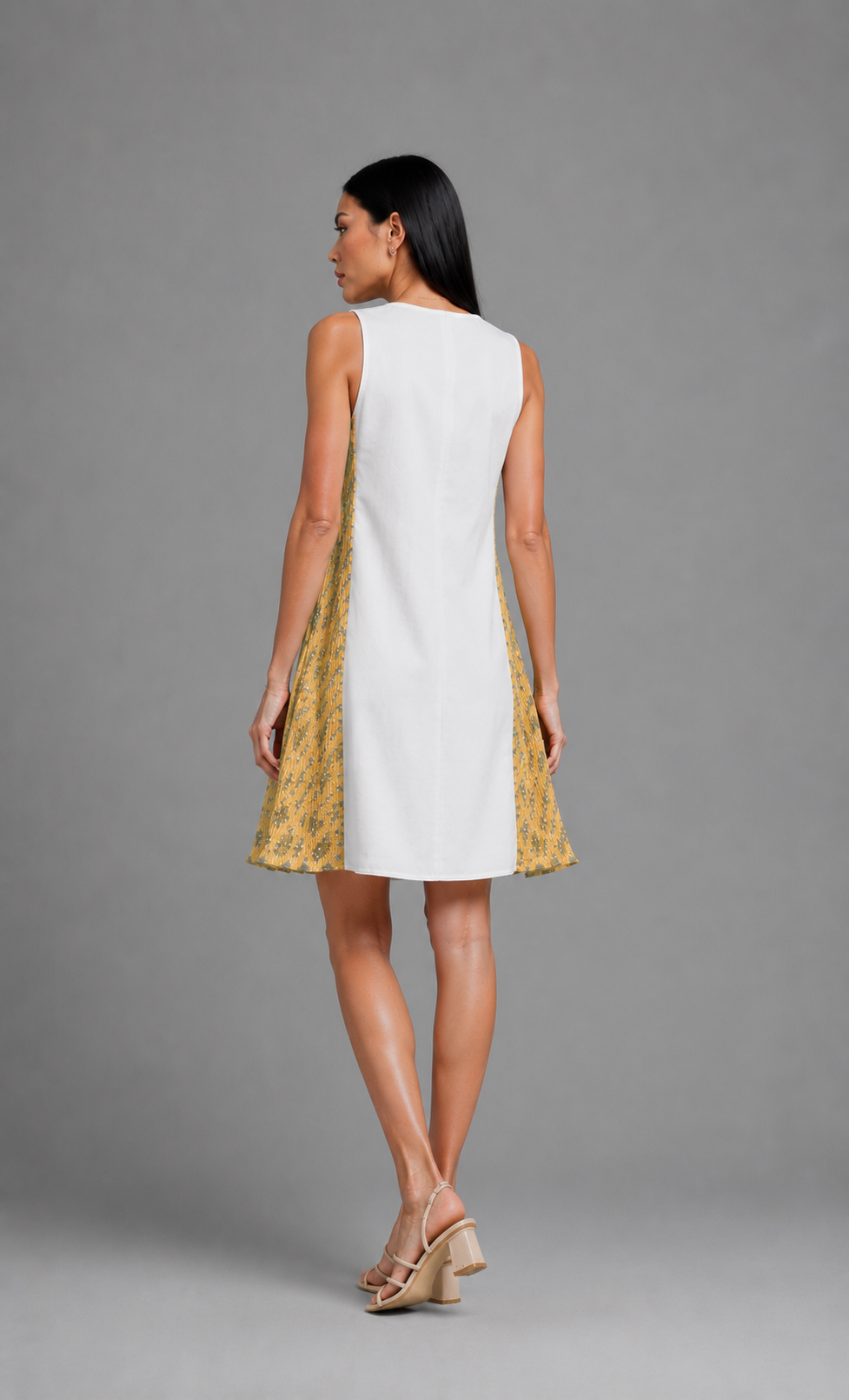 White and yellow pleated dress