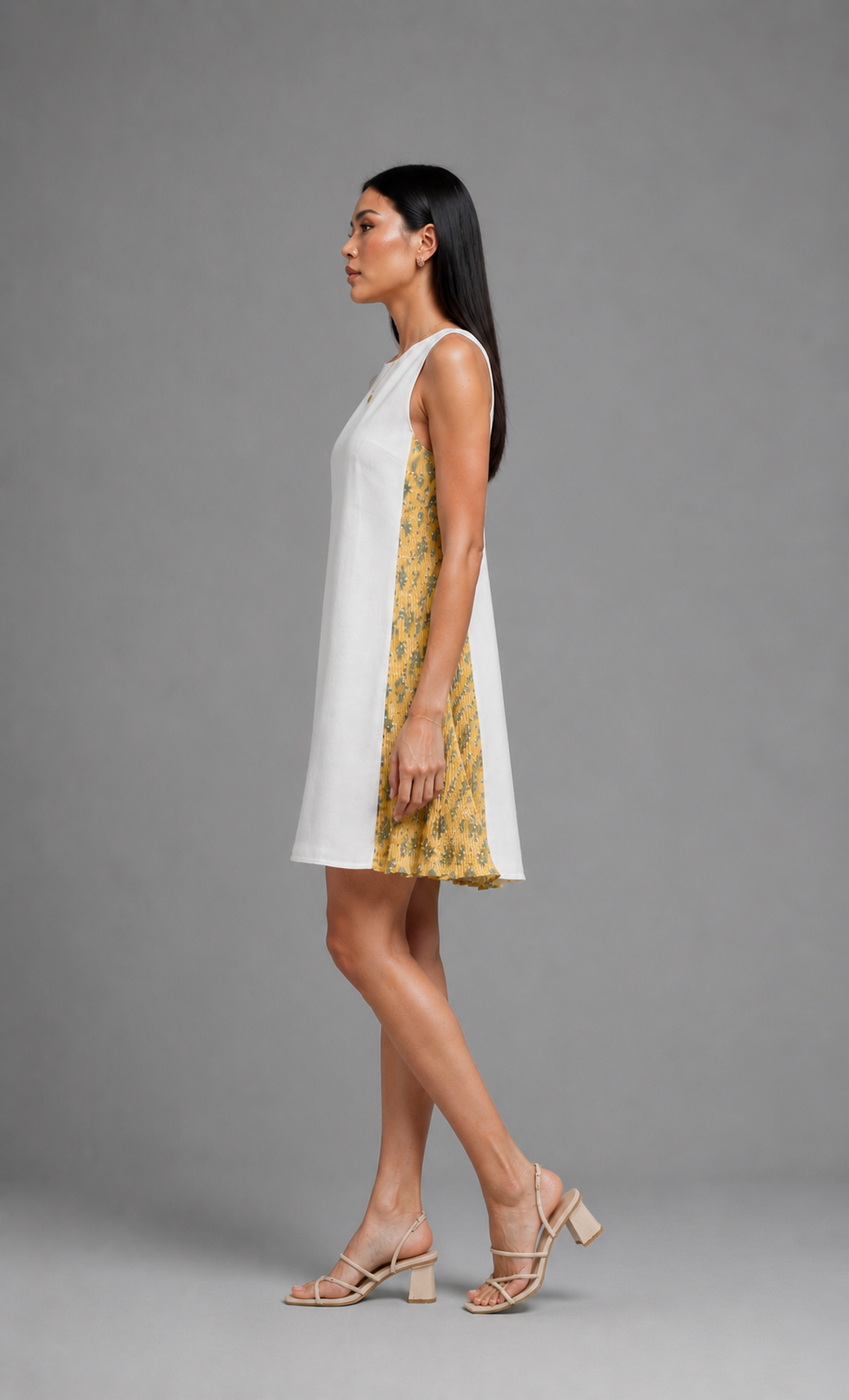 White and yellow pleated dress